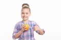 Small girl with an apple Royalty Free Stock Photo