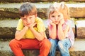 Small girl and boy on stairs. Relations. childhood love. couple of little children. Boy and girl. summer holiday and Royalty Free Stock Photo