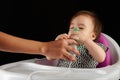 Small girl breathing with inhaler Royalty Free Stock Photo