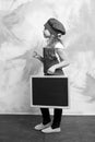 Small girl chef in hat, apron with blackboard Royalty Free Stock Photo