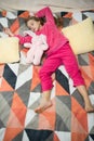 Small girl child ready to sleep. Time to relax. Childhood happiness. Pajama party. Good night. Little happy girl in Royalty Free Stock Photo