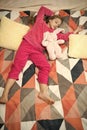 Small girl child ready to sleep. Time to relax. Childhood happiness. Pajama party. Good night. Little happy girl in Royalty Free Stock Photo