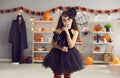 Little girl in costume for Halloween celebration