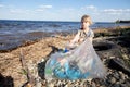 Small girl collecting rubbish