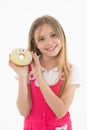 Small girl with donut isolated on white. Candyshop concept. Childhood and happiness. Happy child hold glazed ring