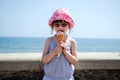 Small girl in glasess and sun hat with ice cream Royalty Free Stock Photo