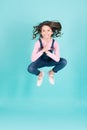 Small girl happy jump in yoga pose, energy Royalty Free Stock Photo