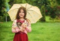 Small girl hold cute kitten. kid love her pet. human and animals. love and care. fluffy cat in hand of pretty child Royalty Free Stock Photo