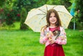 Small girl hold cute kitten. kid love her pet. human and animals. love and care. fluffy cat in hand of pretty child Royalty Free Stock Photo