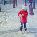 Small girl playing with snow Royalty Free Stock Photo