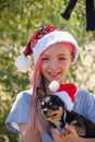 Small girl in santa hat with present have a christmas. little girl in red santa hat. Girl in santa hat Royalty Free Stock Photo