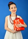 Small girl with shopping package, black friday. Boxing day, holiday celebration and party. Child girl with present pack