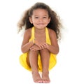 Small girl sitting on the floor Royalty Free Stock Photo