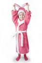 Small girl stands in the pink Bathrobe Royalty Free Stock Photo