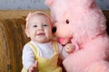 Small girl and toy bear Royalty Free Stock Photo