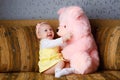 Small girl and toy bear Royalty Free Stock Photo