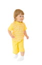 Small girl in yellow shirt and pants Royalty Free Stock Photo