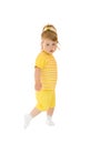 Small girl in yellow shirt and pants Royalty Free Stock Photo