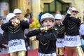 Enchanting Rhythm: Small Girls Illuminate World Dance Day in Black and Gold Attire