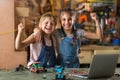 Girls cooperating while making a robot Royalty Free Stock Photo