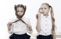 Small girls with tail hairdo. Children need new hairdo in hair salon. small girls back to school