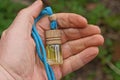 A small glass bottle with a green perfume Royalty Free Stock Photo