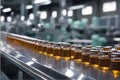 Small glass bottles on a fully automatic assembly line in the modern food and drug industry
