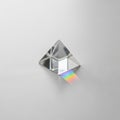 Surrounding area is minimalistic emphasizing the prism and the rainbow Royalty Free Stock Photo