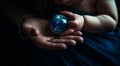 Small globe holding in hands. World sphere in child hands. generative ai Royalty Free Stock Photo