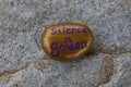 Small gold painted rock states Silence is Golden Royalty Free Stock Photo