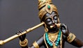 Small gold statue of Krishna, at a Hare Krishna Royalty Free Stock Photo