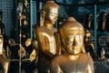 Small golden Buddha statues in Mandalay.