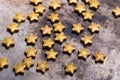 Small golden stars on a old metal background Royalty Free Stock Photo