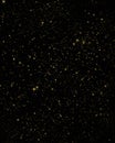 Small golden stars, splatter, dots on black background.