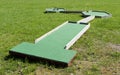 Small golf course built for children in a recreational space.