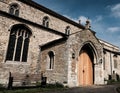 Small, gothic type church door which is located near the crypt of the old church.