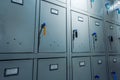 Small gray lockers compartments at pubic area background Royalty Free Stock Photo