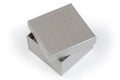 Small gray square cardboard box with partly open lid Royalty Free Stock Photo