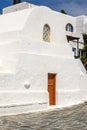 Small Greek chapel of Ios at the main square of the town of Chora on Ios Island. Cyclades, Greece Royalty Free Stock Photo