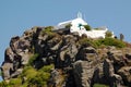 Small Greek church on the cliff Royalty Free Stock Photo