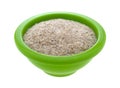 Bowl filled with psyllium husks on a white background