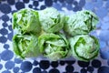Small green cabbages of fresh Peking salad cabbage