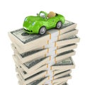 Small green car on a big pack of dollars. Royalty Free Stock Photo