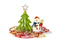 Small green Christmas tree toy and snowman with birdhouse isolated Royalty Free Stock Photo