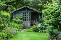 Small green fenced back yard with garden and shed. Gardening tools shed. Generative AI Royalty Free Stock Photo