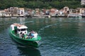 Small ferry in the bay of pasaia in basque country Royalty Free Stock Photo