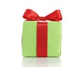 Small green gift box with red ribbon bow isolated on white Royalty Free Stock Photo