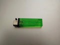 Small green handy gas lighter Royalty Free Stock Photo