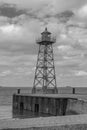 Small green lighthouse at the mouth of the Geeste River in the North Sea, Bremerhaven Royalty Free Stock Photo