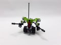 Small Green Transformable Robot Toy On White Isolation Background 16